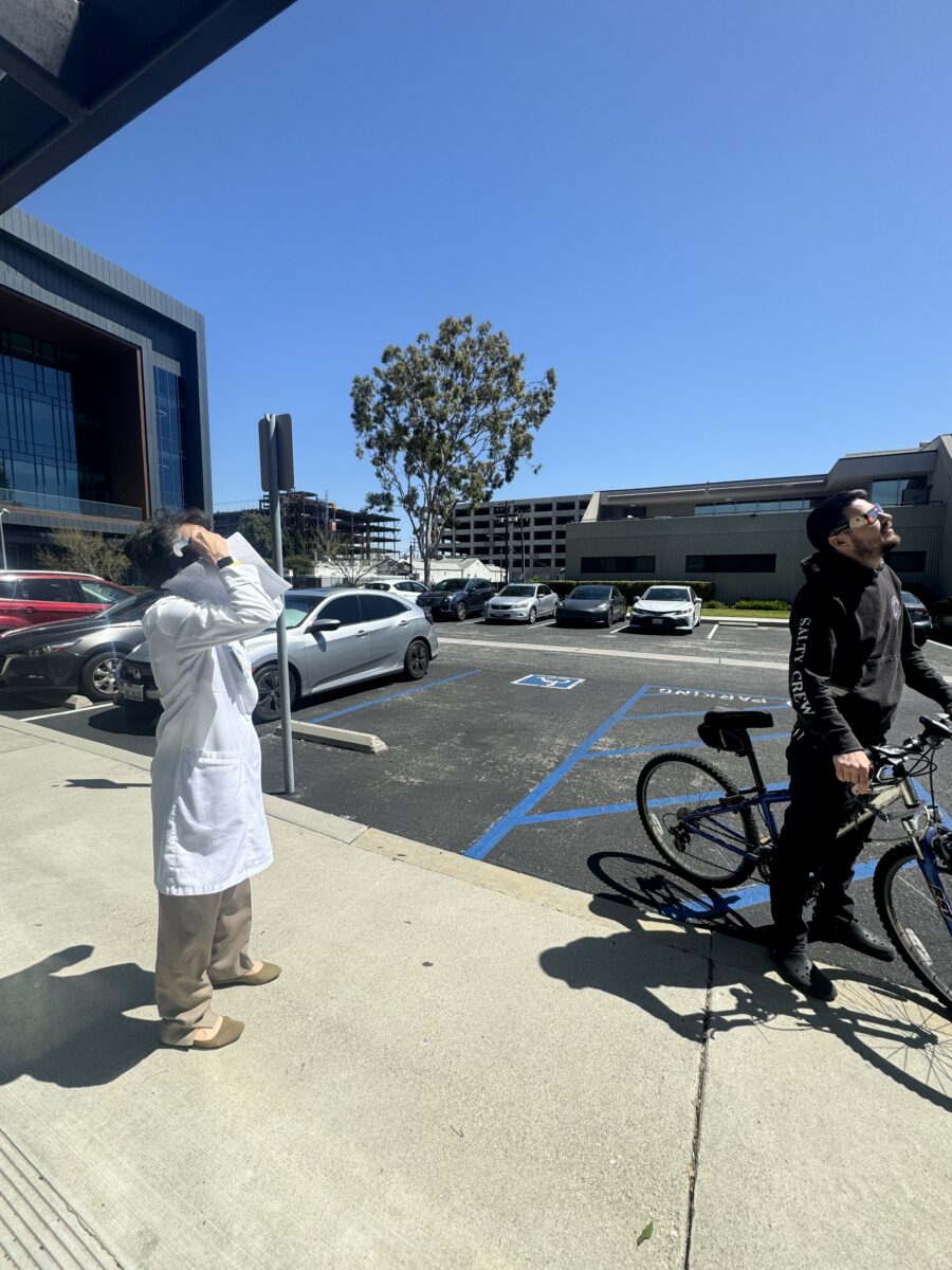 Dr Wang during a solar eclipse
