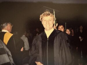 Dr. de Virgilio on the day of his graduation in a cap and gown.